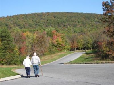 Mountain Shot With Walking Couple