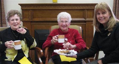 Discussing views over coffee and cookies in the Leisure Center.