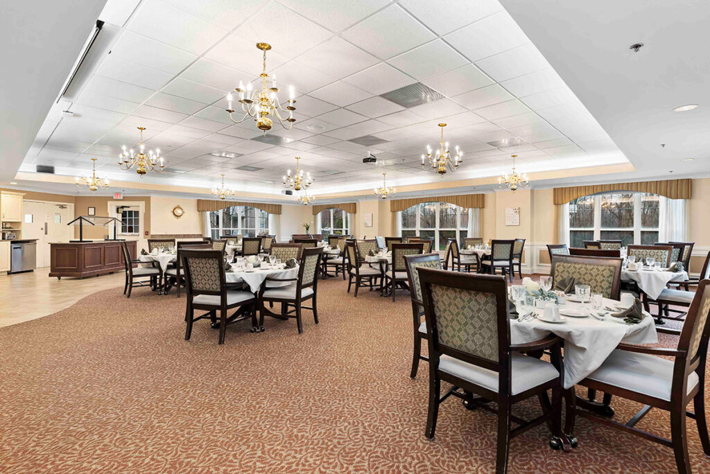 Kindred Place at Annville senior apartments view of community dining room with tables, linens