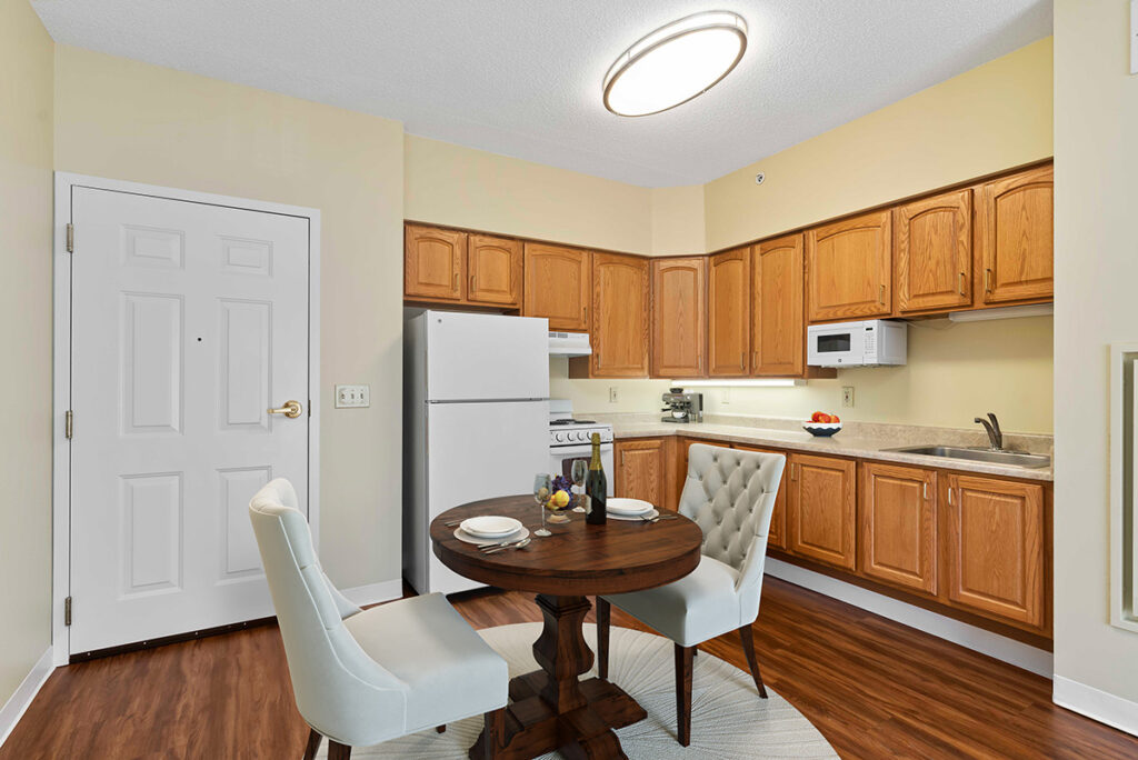 dining room and kitchen at Kindred Place Harrisburg at senior apartments
